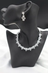 Square-cut zircon necklace with halo design and matching drop earrings in premium stainless steel.